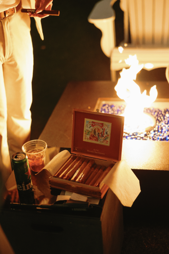 cigar box by a fire pit at a wedding