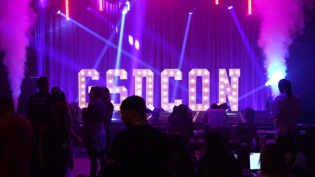 photo showing the GSDCON conference by LoudRumor, produced by Centric Events, with fog and stage lighting