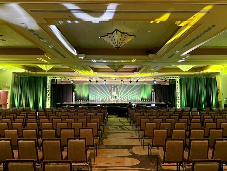staging and audio visual set up including lighting, draping, staging, trussing and audio for a dance competition 