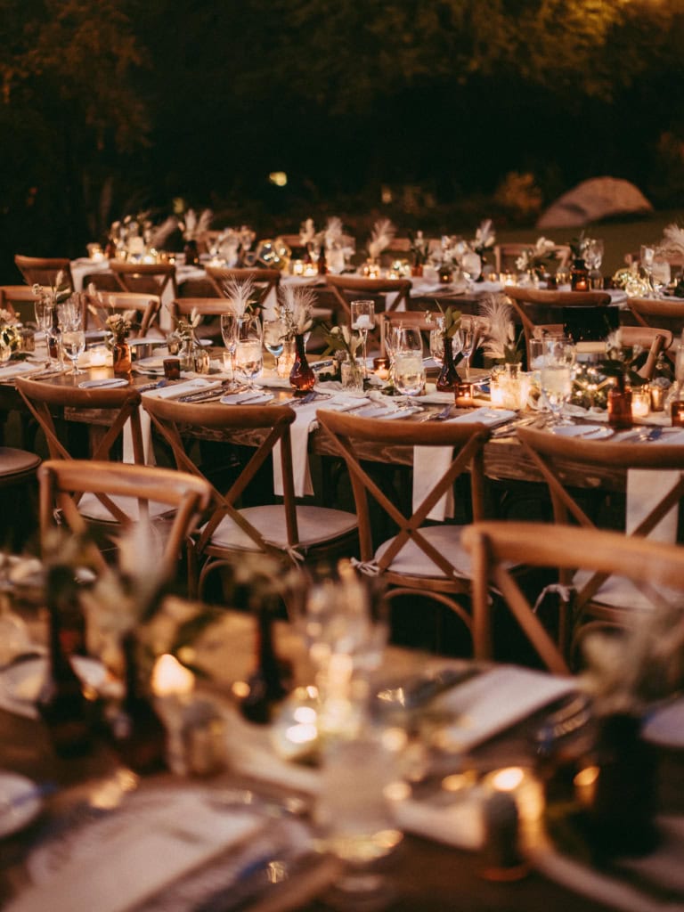 luxury wedding with x back chairs, or cross back chairs, and farm tables 