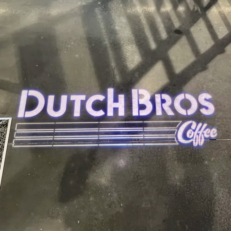 The iconic Dutch Bros logo precisely projected onto the event facility floor using custom cut gobo lights.